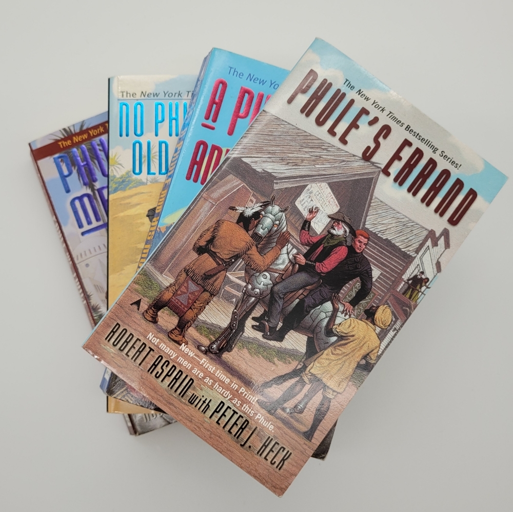 PHULE SERIES by ROBERT ASPRIN | 4 of 6 paperback books in the series